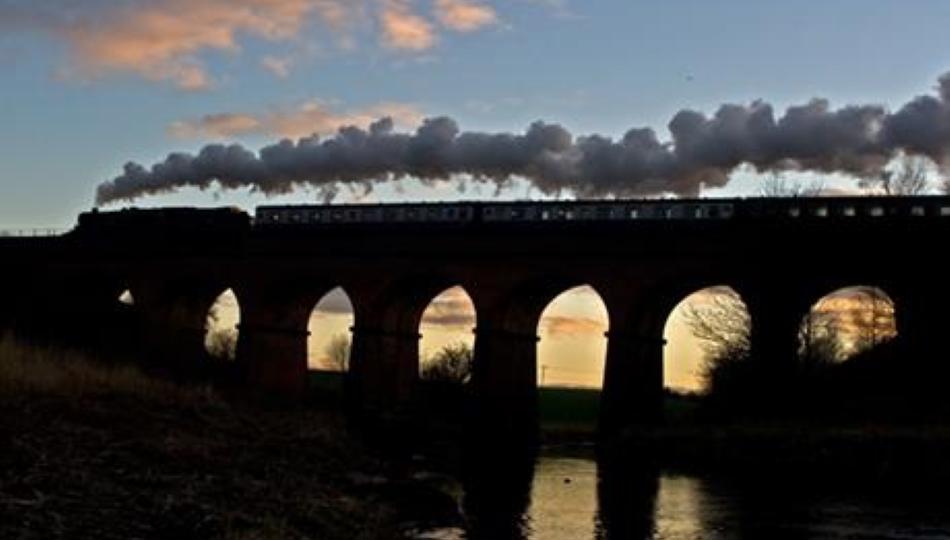 The East Lancashire Railway travelling over the Summerseat Viaduct